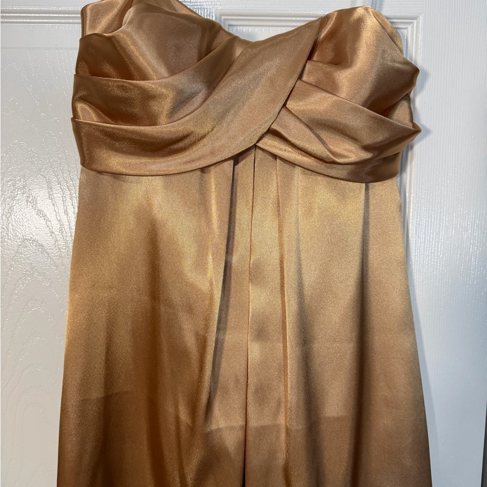 Onyx Nite Strapless Gold Top‎